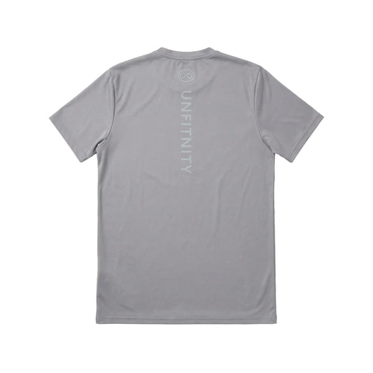 T-shirt gris dos, coupe droite, inscription verticale et logo discrets, style minimal sport